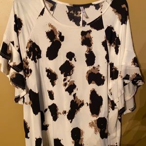 Blouse from brand Yee.   Print is fabulous